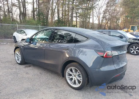 2023 Tesla Model Y Awd/Long Range Dual Motor All-Wheel Drive z USA, uszkodzony, nr VIN 7SAYGDEE5PA125274